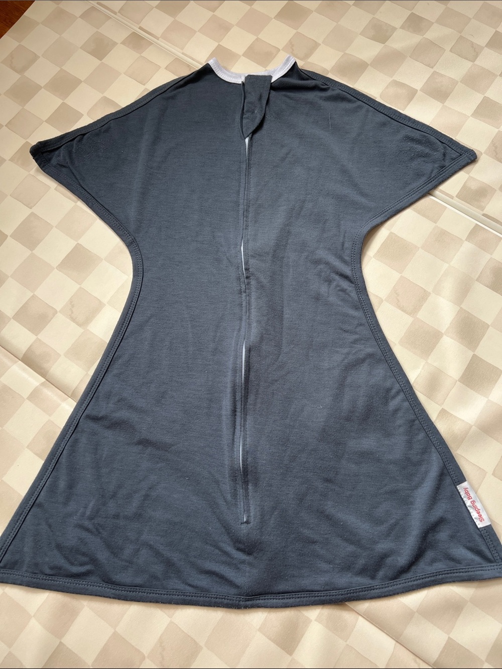 2 of 2. Sleeping baby, zipadee zip swaddle, size small